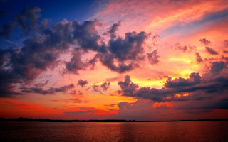 Sunset clouds boat water horizon 2 - colorful cloud free wallpaper