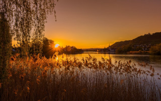 Sunset river boat trees hill - evening free wallpaper