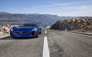 Blue sports car mountain road 2 - vorticism free wallpaper