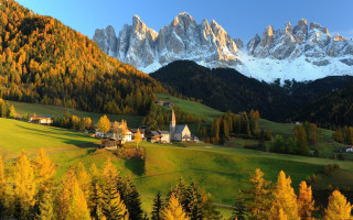 Mountain church autumn leaves florence - a mountain range in the background free wallpaper