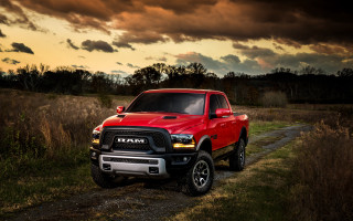 Red ram truck dusk mountain - a dirt road in a field free wallpaper