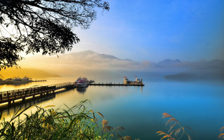 Pier boat mountain fog scenery - the water and a mountain in the background free wallpaper