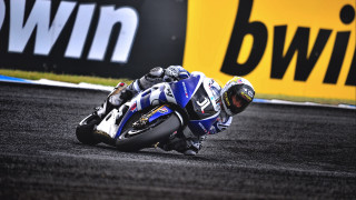 Motorcycle leaning track helmet sign - motion blur free wallpaper