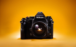 Black camera yellow background sunset - nikon free wallpaper
