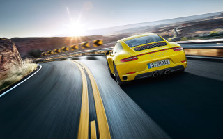 Yellow sports car mountain sunset 3 - a road near a mountain range free wallpaper