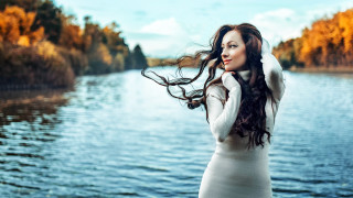 Woman lake autumn long hair - the background and a sky free wallpaper