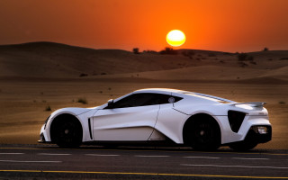 White sports car desert sunset - a road in the desert free wallpaper
