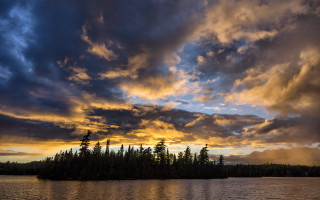 Sunset lake trees clouds boat - a boat in the foreground free wallpaper