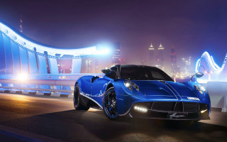 Blue sports car bridge night - a blue sports car free wallpaper