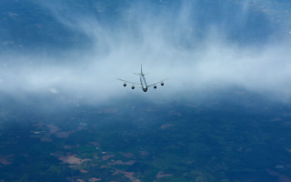 Plane clouds lights matte night - a few light free wallpaper