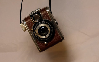 Brown camera white table phone - a white table next free wallpaper