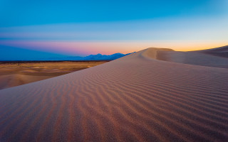 Desert sand dunes mountains sunset - a few sand free wallpaper