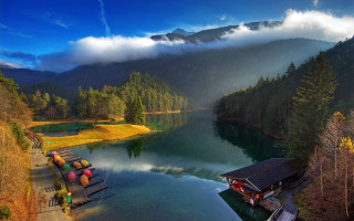 Lake mountains dock canoes boathouse - a dock free wallpaper
