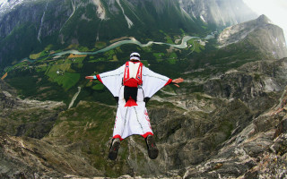 Flying person white red mountain - zenith view free wallpaper