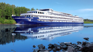 Large boat dock rocks trees - a large boat free wallpaper