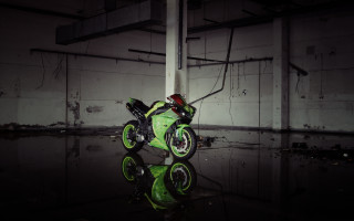 Green motorcycle dark room mirror - a green motorcycle free wallpaper