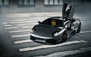 Black sports car open doors - a street corner free wallpaper
