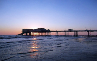 Pier sunset reflection cityscape clouds - a pier free wallpaper