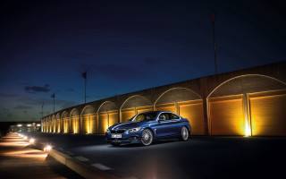 Blue car building night lights - a blue car free wallpaper