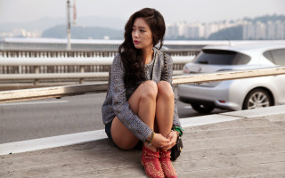 Woman sitting gray sweater red - movie free wallpaper