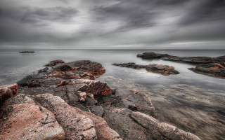 Rocky shore mountainous horizon moody - moody free wallpaper