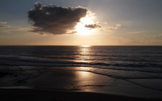 Sunset ocean beach cloud mountain - a beach in the foreground free wallpaper