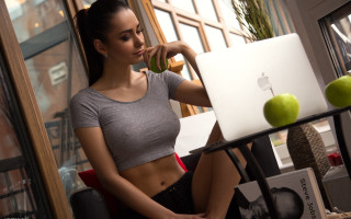 Woman sitting laptop apple graphics - a laptop free wallpaper