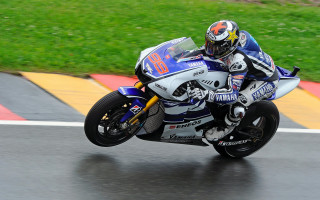 Motorcycle rider rain race track - a person riding free wallpaper