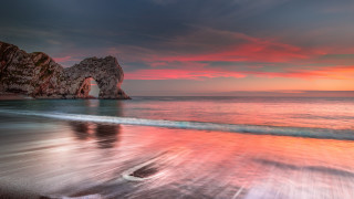 Beach rock formation sunset pink 2 - rich moody colours free wallpaper