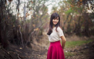 Woman red skirt forest autumn - a red skirt free wallpaper