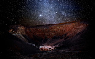 Mountain starry sky hole ground - sky above free wallpaper