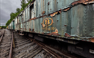 Rusty train car decay matte - side and a sign free wallpaper