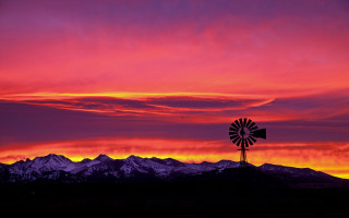 Windmill sunset mountains pink sky - a windmill in the distance free wallpaper