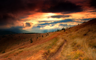 Dirt path hill sunset clouds - a dirt path free wallpaper