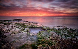 Rocky shore sunset hole matte - a hole in the middle of it free wallpaper