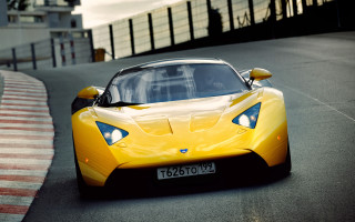 Yellow sports car race track 16 - in the foreground free wallpaper