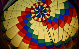 Colorful hot air balloon inflated - saturated free wallpaper