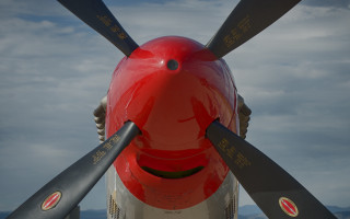 Propeller closeup sky clouds person - f 8 aperture free wallpaper