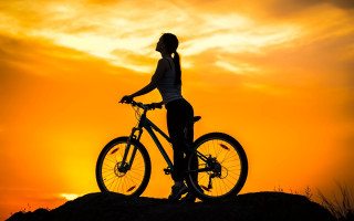 Woman hill bike sunset sky - top of a hill next free wallpaper