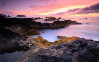 Rocky beach sunset clouds foreground - a rocky beach free wallpaper for desktop