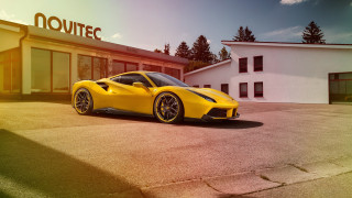 Yellow sports car nomite building - a yellow sports car free wallpaper