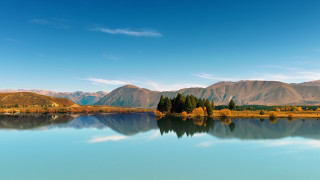 Lake mountains trees blue sky 4 - a clear blue sky above free wallpaper