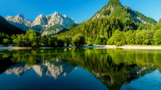 Mountain lake reflection forest landscape - a clear blue sky free wallpaper