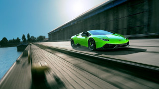Green sports car road water - a green sports car free wallpaper