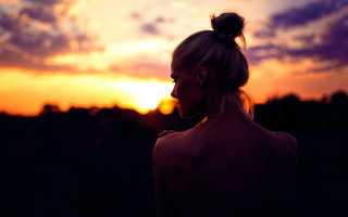 Woman sunset backlighting fiery hair - a bun free wallpaper