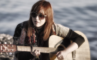 Woman sunglasses guitar water rock - the waters edge free wallpaper