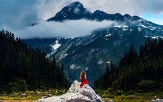 Mountain woman rock forest sky - a forest below free wallpaper