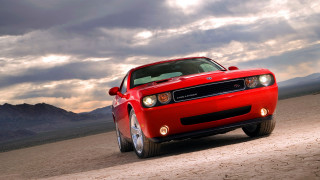 Red sports car dirt road 2 - a red sports car free wallpaper