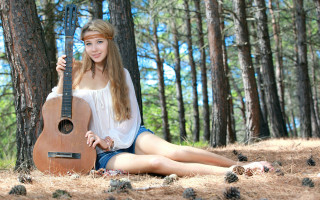 Woman woods guitar pinecones outdoors - her foot free wallpaper