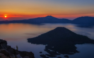 Sunset lake mountain island forest - a sunset over a lake free wallpaper